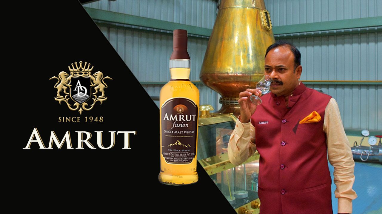 Photographs of Amrut Head of Distilling Ashok Chokalingam and a bottle of Amrut Fusion Whisky next to an image of the Amrut logo