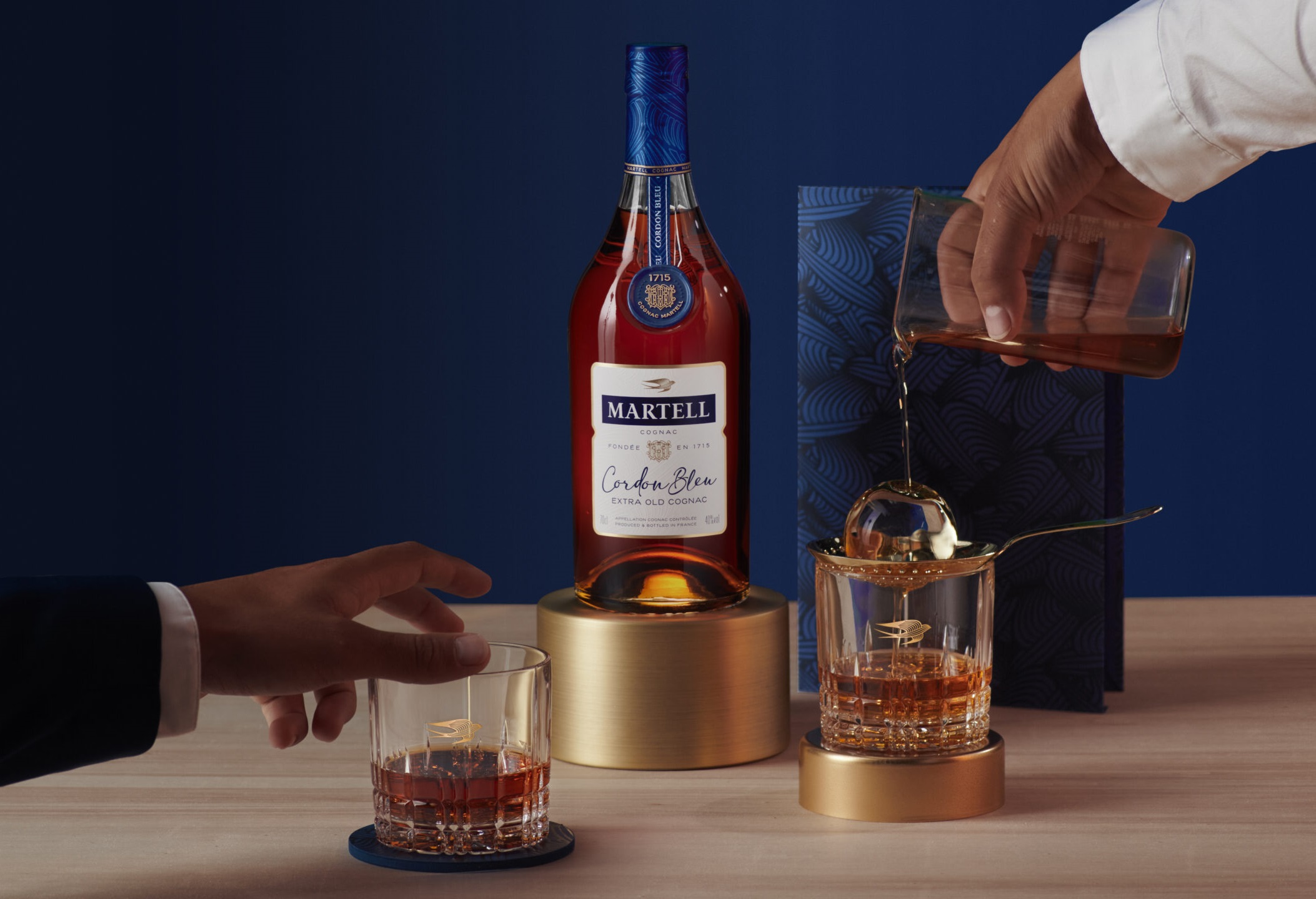 Cognac and Brandy are distinct spirits made by distilling wine, each with its own aging process.