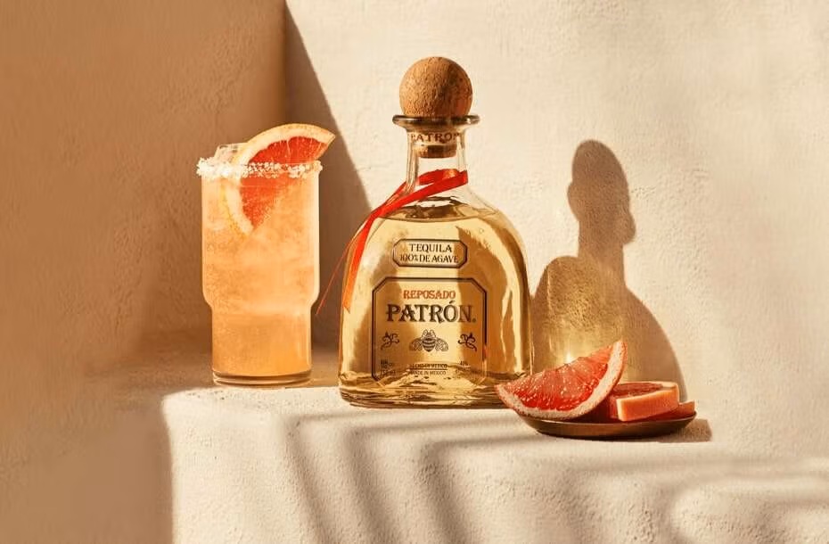 Reposado Tequila, meaning "rested," is aged in oak barrels for 2 to 12 months, developing a complex and mellow flavor profile compared to Blanco.